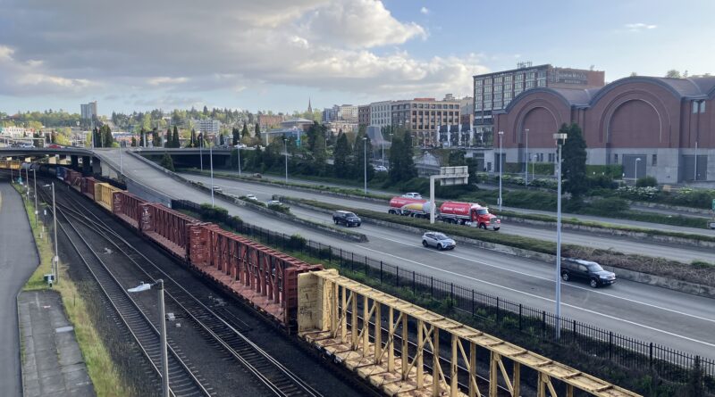 highway in Tacoma, WA to represent why drivers should stop speeding to save money